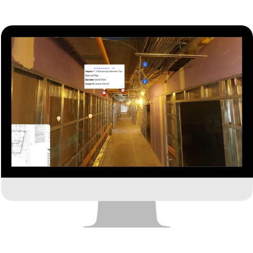 Person viewing 360 capture on monitor